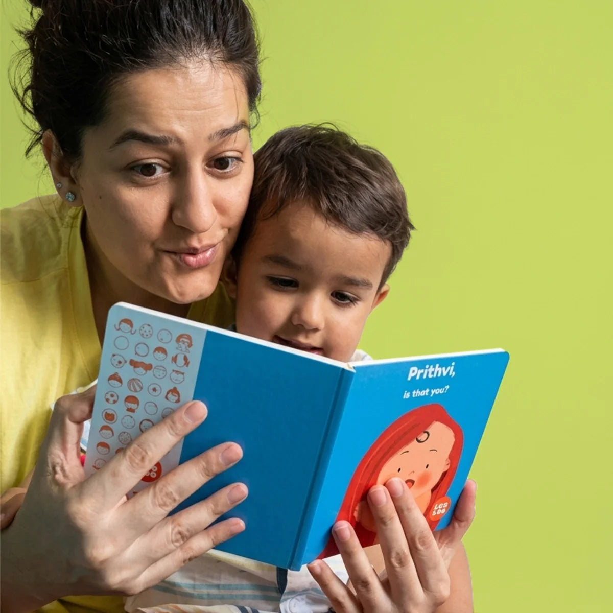 A mother reading a colorful personalized children's storybook to her young child. 